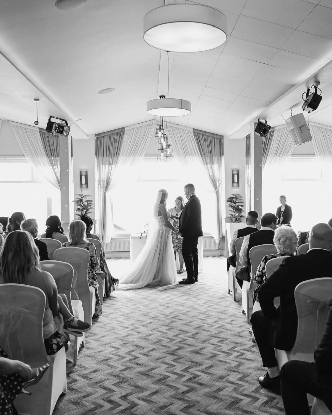 black and white phot of th epier house wedding couple